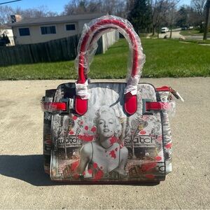 Stylish Women's Handbag with Iconic Print